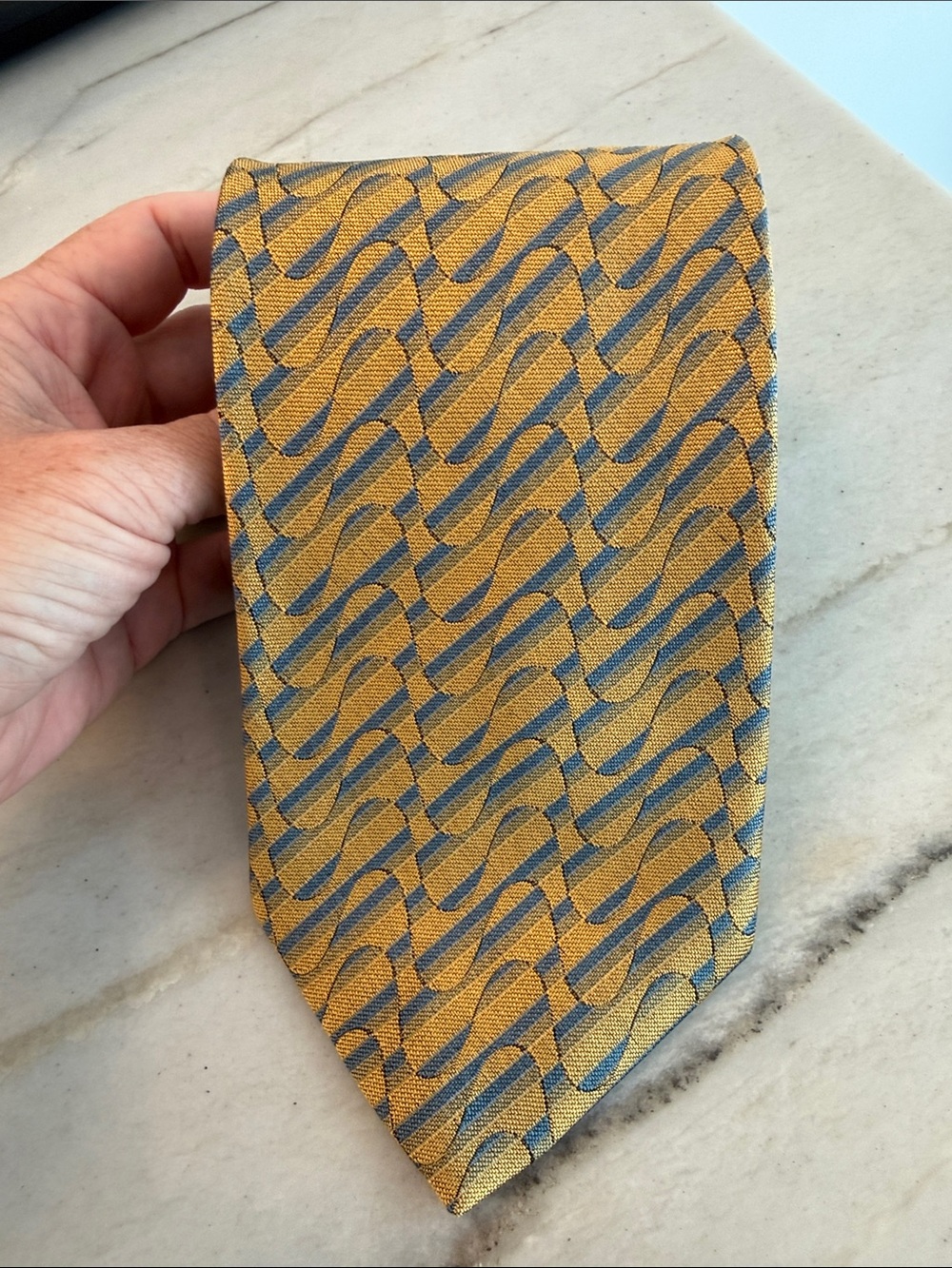 XMI Gold silk Tie with Blue Wave Pattern